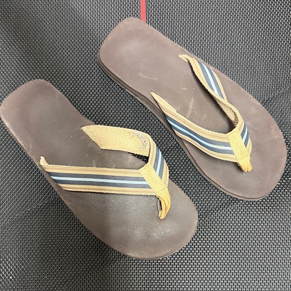 Source Unknown Brown Flip-Flops with Blue and Tan Striped Straps